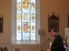Monsignor Joseph McGuinness, Diocesan Administrator of the Diocese of Clogher, speaking at St Macartan's Church, at the event to unveil a plaque in honour of Archbishop John Joseph Hughes. In the background is a memorial stain glass window, which is dedicated to Archbishop John Joseph Hughes. Â©Rory Geary/The Northern Standard