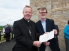 Archbishop Eamon Martin, Archbishop of Armagh and Primate of All-Ireland and Daniel J Lawton, American Consul General to Northern Ireland, with the letter from Archbishop of New York, Timothy M Dolan, at the event to unveil a plaque in honour of Archbishop John Joseph Hughes. Â©Rory Geary/The Northern Standard
