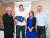 Eddie O'Gara, 2nd from left, accepting a presentation on behalf of Anthony Martin, Monaghan Phoenix AC, from Fr Paudge Corrigan. Also included are Rose Lambe and Chairman of the Monaghan County Athletics Board, Alan Clarke. Â©Rory Geary/The Northern Standard
