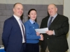 Mr Paddy Flood, right, director of schools, Cavan and Monaghan Education and Training Board, making the presentation of the first Junior Cycle Profile of Achievements, Niamh Arthurs, from Beech Hill College. Also included is Principal Patrick McArdle. Â©Rory Geary/The Northern Standard