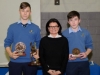Suzanne McGinnity, making the presentation of the 1st Year Handballer of the Year Awards to Denis Juozaitis, left and Oran Maguire. Â©Rory Geary/The Northern Standard