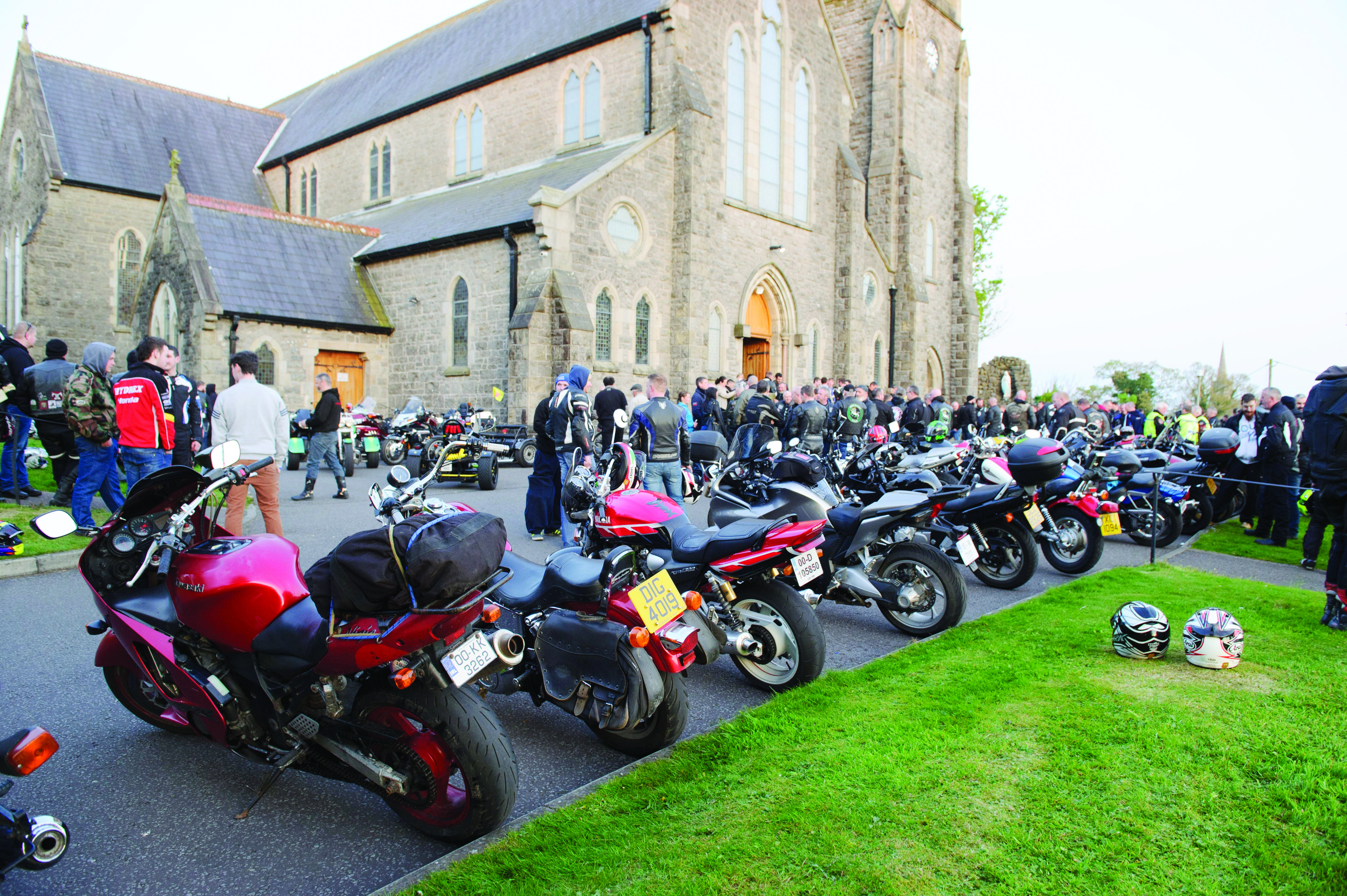 A line-up of motorbikes outside the church during the Gone But Not Forgotten Bikers Mass. Â©Rory Geary/The Northern Standard