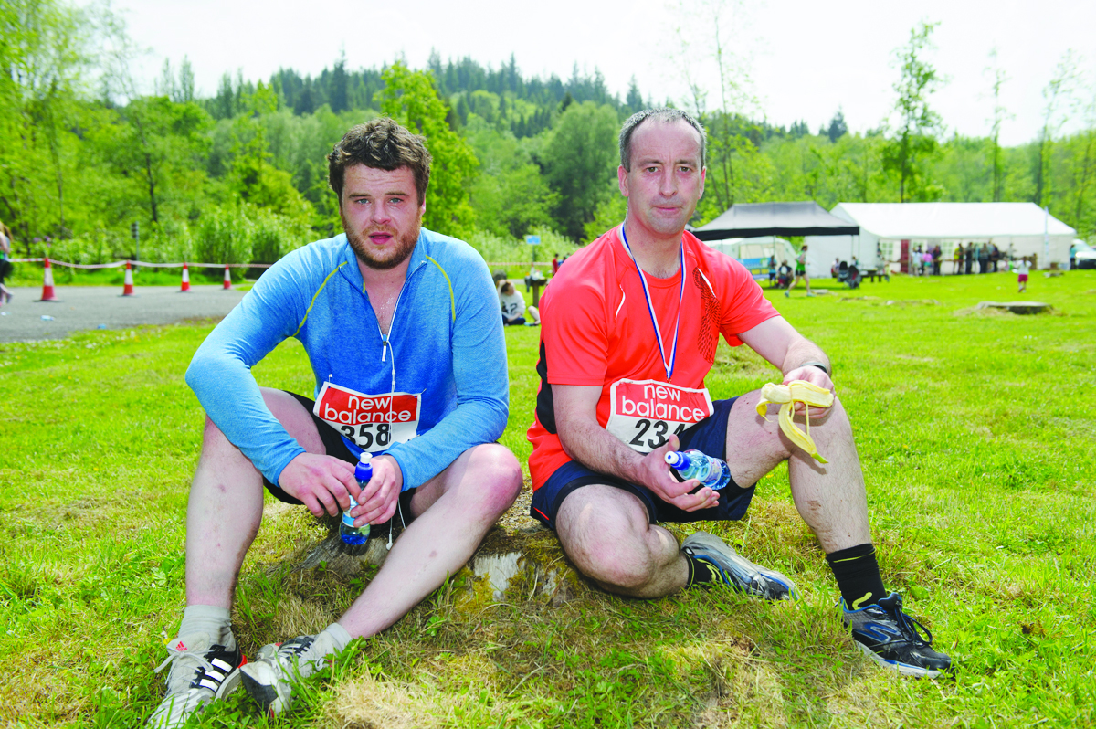 Sean McKenna and Adrian Larkin taking a rest after running the Blackwater 10k. Â©Rory Geary/The Northern Standard