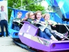 Some of the children on one of the fairground rides at the Carrickroe Welcome Home Festival. Â©Rory Geary/The Northern Standard