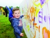 Ruadh Curley painting during the sports day at Carrickroe Welcome Home Festival. Â©Rory Geary/The Northern Standard