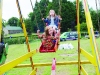 Anna McElroy and Lucy O'Neill on the swingboats at the Carrickroe Welcome Home Festival. Â©Rory Geary/The Northern Standard
