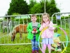 Keegan and Erin Treanor at the petting farm during the day. Â©Rory Geary/The Northern Standard