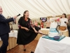 Sammy Leslie cutting the cake at the victorian tea-party to celebrate the 25th anniversary of the opening of the tea-rooms at Castle Leslie. On left is Brian Baldwin, manager of the Castle Leslie Estate. Â©Rory Geary/The Northern Standard