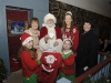 Santa making the draw for the winning ticket in the Clones Community Forum Christmas draw. Included are Josephine McKenna, Cathy Kirke, Cassandra Hand Queen and Mary Cosgrove, Clones Community Forum. Â©Rory Geary/The Northern Standard