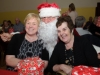 Sheila Reynolds and Josephine Cummins with Santa at the Clontibret Social Club Christmas Party. Â©Rory Geary/The Northern Standard
