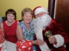Santa with Cora Smith and Maura Lynch at the Clontibret Social Club Christmas Party. Â©Rory Geary/The Northern Standard