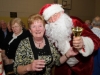 Philomena Gormley with Santa at the Clontibret Social Club Christmas Party in the Clontibret Community Centre. Â©Rory Geary/The Northern Standard