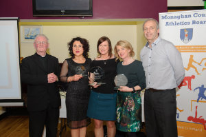 At the presentation of the awards for the Monaghan Road League 45+ Ladies Category, were (L-R) Fr Corrigan, Martina McEnaney, Carrick Aces, 3rd, Marie McArdle representing Helen McCrystal, Monaghan Phoenix AC, winner, Audrey Harraghey, Monaghan Phoenix AC, 2nd and Brian Peppard. Â©Rory Geary/The Northern Standard