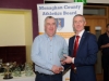 Paul O'Neill, left,Clones AC,  accepting the presentation on behalf of Denis Toner from Alan Clarke, chairman of the Monaghan County Athletics Board. Â©Rory Geary/The Northern Standard
