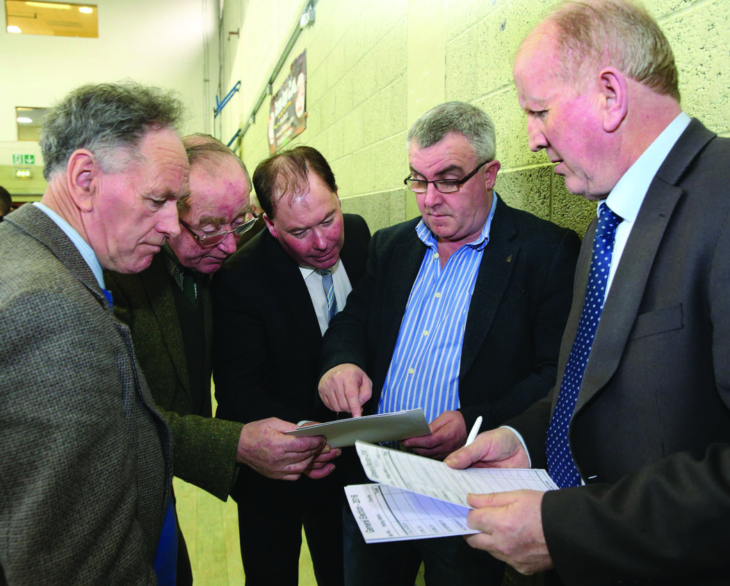 Checking the tallys at the Cavan-Monaghan Count Centre on Saturday last.  Pic.  Pat Byrne.