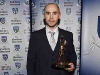 Stephen Gollogly with his County Football Retirement Award. Â© Northern Standard