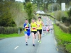 The race leaders, Shane Brady, Conor Duffy and Cillian O'Leary, leading the race out of Glaslough village. Â©Rory Geary/The Northern Standard
