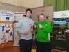 Brian Finn, chairman of Glaslough Harriers, right, making the presentation of the John Curley Cup to winner of the 5k, Cillian O'Leary, Raheny Shamrocks AC. Â©Rory Geary/The Northern Standard
