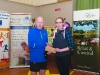 Winner of the Mens V-50 prize, Dermot Kerr, Armagh AC, being presented by Amy Hamill. Â©Rory Geary/The Northern Standard