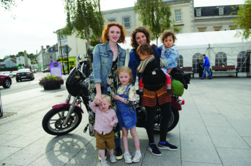 Cait McCarey and Charlotte Batsaikha in Monaghan for the festival, with some of their families. Â©Rory Geary/The Northern Standard