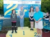 The winners of the 7-8 Girls Breast Stroke, with Norman Griffin. Â©Rory Geary/The Northern Standard