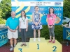 The winners of the 9-10 Girls Front Crawl, with Norman Griffin. Â©Rory Geary/The Northern Standard