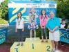 The winners of the 9-10 Girls Breast Stroke, with Norman Griffin. Â©Rory Geary/The Northern Standard