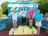 The winners of the 11-12 Girls Front Crawl, with Norman Griffin. Â©Rory Geary/The Northern Standard