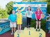 The winners of the 11-12 Girls Breast Stroke, with Norman Griffin. Â©Rory Geary/The Northern Standard