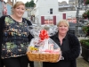 Winner of the 1st prize in the Monaghan Canada Day celebrations raffle, Brenda Clerkin, right, being presented by Ashling Clerkin. Â©Rory Geary/The Northern Standard