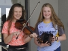 Aoibheann Treanor, left and Aisling NÃ­ GhallchÃ³ir, Baile MhuineachÃ¡in CCE, who were winners of the U-15 Trio, along with Dearbhla NÃ­ GhallchÃ³ir. Aisling was 2nd in the U-15 Fiddle and Aoiobheann was winner of the U-15 Concertina. Â©Rory Geary/The Northern Standard