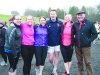 Martin Chambers, centre, with member of the Monroe family at the Monaghan Phoenix AC Goal Mile on St Stephen's Day. Â©Rory Geary/The Northern Standard