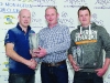 Diarmuid Leane, left, making the presentation winners of Class 11R, Seamus Connolly, left and Gary McCrudden. Â©Rory Geary/The Northern Standard