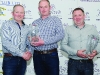 Diarmuid Leane, centre, making the presentation to winners of Class 10, John Kelly, left and Niall Kelly. Â©Rory Geary/The Northern Standard