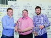 Fintan Keenan, centre, presenting the winners of Class 5, Stephen Wright, left and Fintan Sherry, with their awards. Â©Rory Geary/The Northern Standard