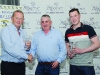 Thomas Treanor, centre, presenting Robert Moffett, left and Niall Tierney, with their awards for 3rd in Class 5. Â©Rory Geary/The Northern Standard