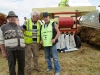 Working on one of the threshers were (L-R) Willie Irwin, Pete Moen and Martin Cassidy. Â©Rory Geary/The Northern Standard