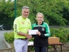 Eithne McGorman, Carrick Aces, receiving 1st prize for Female Over-35 from Colm Mahoney, Monaghan Town Runners. Â©Rory Geary/The Northern Standard