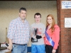 Shane Brady, centre, Clones AC, being presented with the cup for winning The Ned Run by Stephen McKenna and Shauna McAree, Tydavnet Show Queen. Â©Rory Geary/The Northern Standard