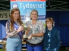 Tydavnet Show Queen Shauna McAree, left and President of Tydavnet Show, Mary Sherry, right, presenting Eleanor O'Neill with the Country Markets Cup for Jam & Chutney. Â©Rory Geary/The Northern Standard