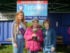 Tydavnet Show Queen Shauna McAree, left and President of Tydavnet Show, Mary Sherry, right, presenting Evelyn McMahon with the Maggie McQuillian Cup for Peas & Beans. Â©Rory Geary/The Northern Standard
