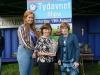 Tydavnet Show Queen Shauna McAree, left and President of Tydavnet Show, Mary Sherry, right, presenting Dympna McKenna, centre, with the Magill Vase for Rose of the Show. Â©Rory Geary/The Northern Standard
