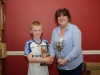 Ann Watterson from The Northern Standard, congratulating Darragh McMeel, on winning the Billy Hayden Cup for Handmade Facemask, the Eamonn Murray Cup for Creative Writing and a Monaghan County Council voucher, at the recent Tydavnet Show. Â©Rory Geary/The Northern Standard