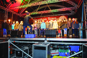 Members of the Gaelscoil Ultain Choir singing at the Monaghan Town Christmas Lights Switch-On. Â©Rory Geary/The Northern Standard