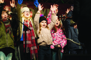 Some of the pupils of Gaelscoil Ultain, singing at the Monaghan Town Christmas Lights Switch-On. Â©Rory Geary/The Northern Standard