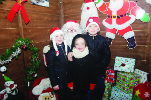 Pictured with Santa were Lauren, Grainne and Luke McDonnell. Â©Rory Geary/The Northern Standard