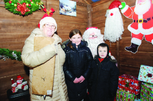 Mary, Niamh and Danny McCarra with Santa at the Monaghan Town Christmas Lights Switch-On, last Sunday. Â©Rory Geary/The Northern Standard