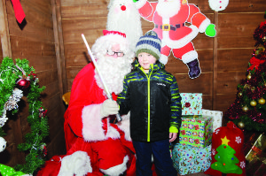 Santa with Kevin McKenna at the Monaghan Town Christmas Lights Switch-On event. Â©Rory Geary/The Northern Standard